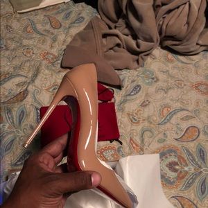 Never worn red bottoms size 8.5